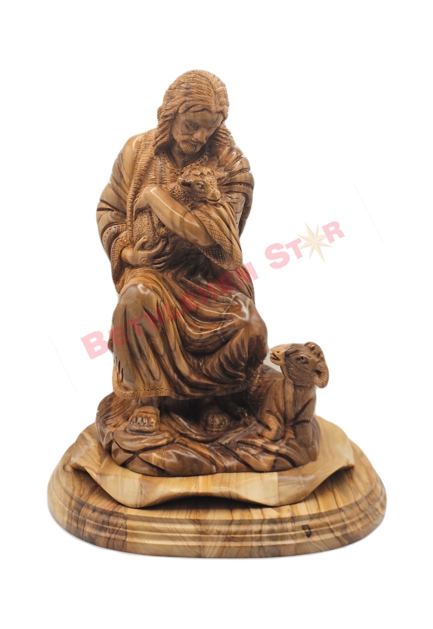 Olive wood hand carved of The Good Shepherd resting on rock